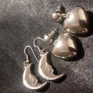 Retro Puffy dangling hearts and puffy half moon faces. In silver tone.
